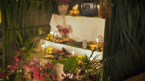 An offering table with food and flowers during Hanal Pixán, Yucatan's version of Day of the Dead