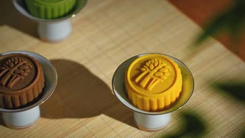 Colourful mooncakes with Banyan Tree's logo 